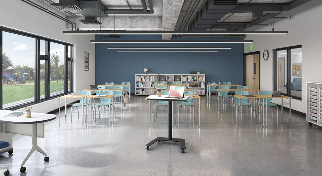 Modern classroom with easy-clean surfaces and module desks, rolling podium and moveable teachers desk with adjustable storage around the room