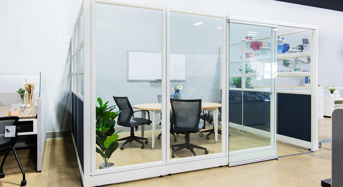 Modern office small space meeting room with modular walls, and ergonomic chairs