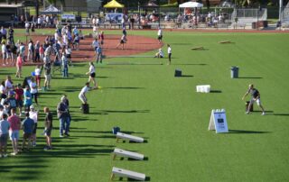 Photo of many people playing lawn games at a United Way fundraising event