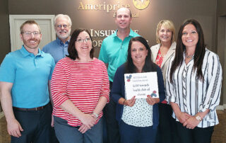 Group photo of New Ulm Chamber of Commerce representatives and Poker Walk Winner